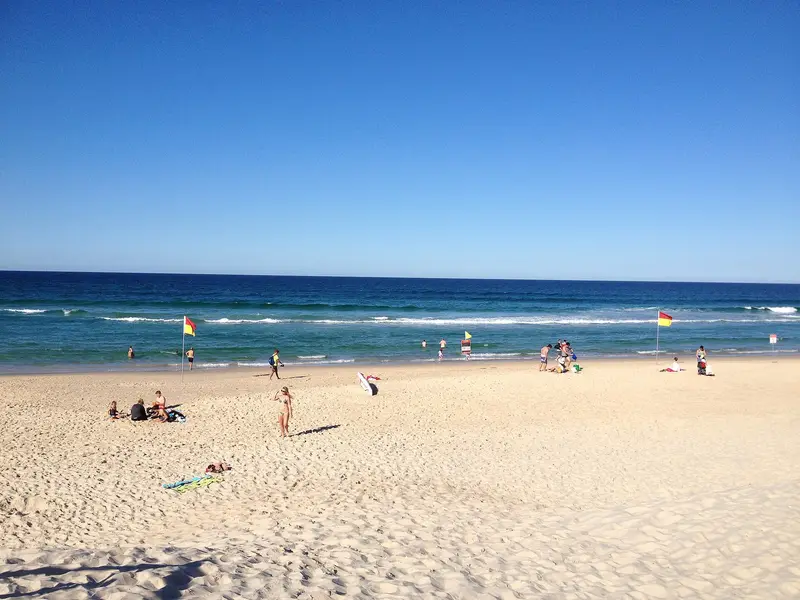 Red-and-yellow surf lifesaving flags on a Gold Coast beach